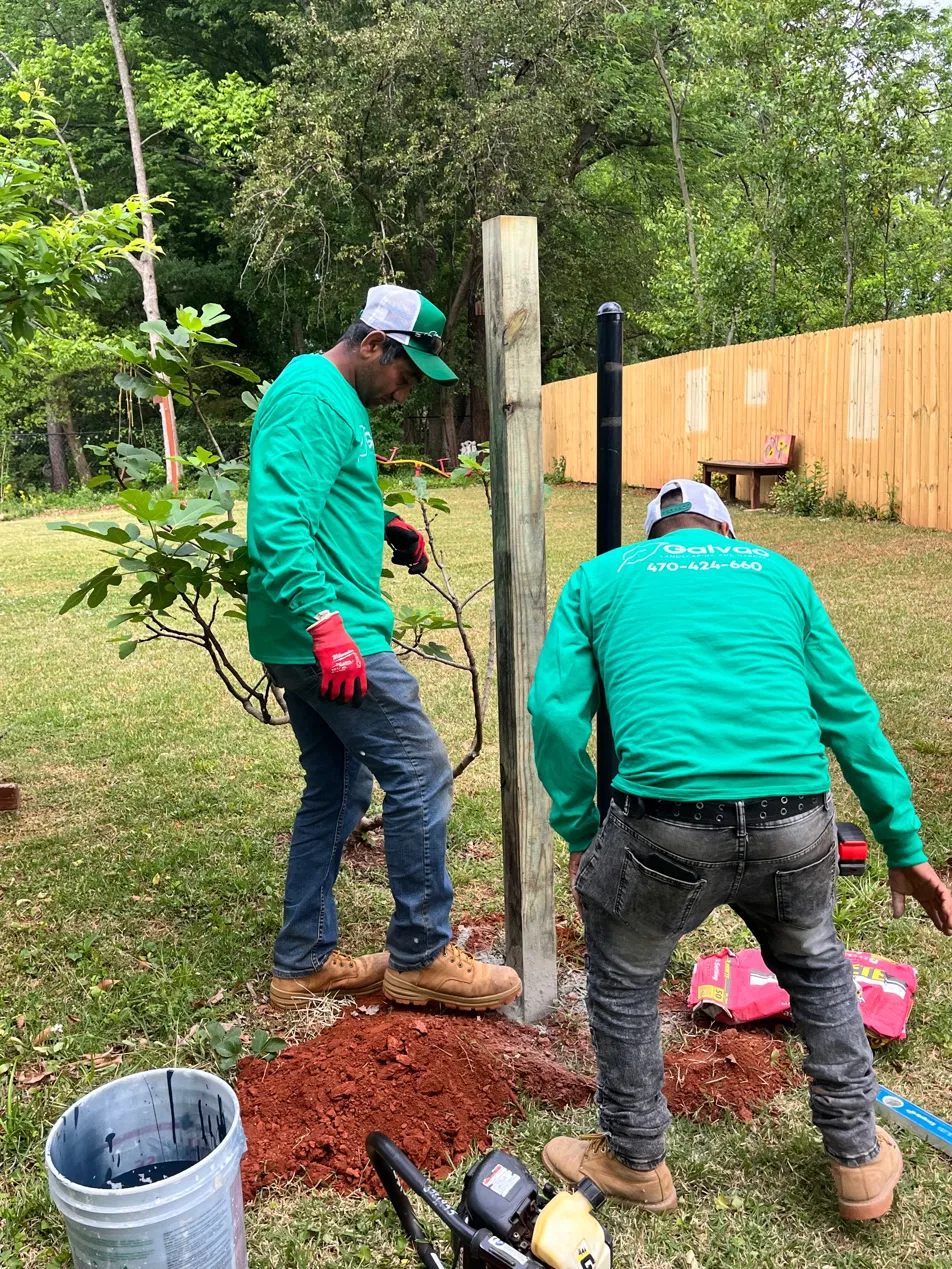Galvao crew installing a wood fence